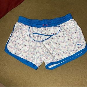 PUMA blue, white and pink athletic running shorts. Women’s size Large